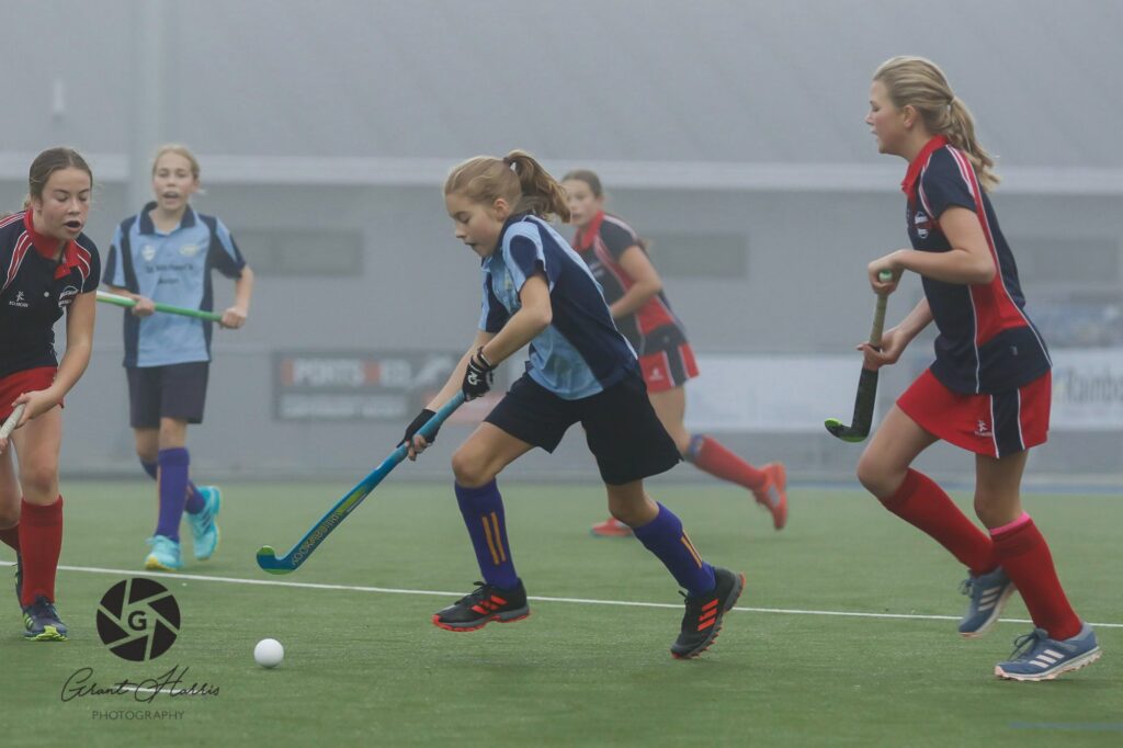 Avon junior players competing for the ball