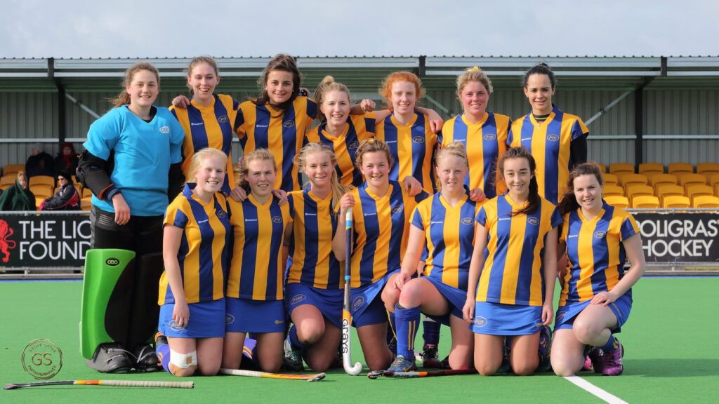 Avon women's team together after a match